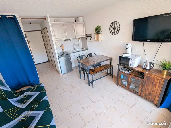 Studio cabine 4 couchages et place de parking
