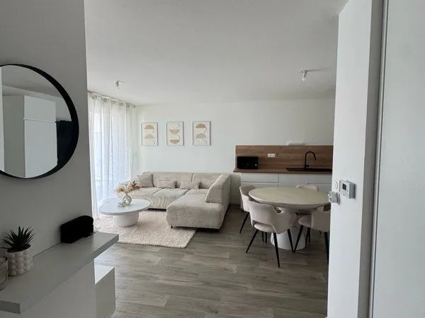 Appartement T3 de 60 m² - Balcon exposé Sud - Parking en sous-sol - Résidence récente et sécurisée -