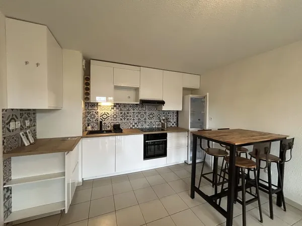 T3 MEUBLE + 2 PARKINGS + JARDIN LAUNAGUET