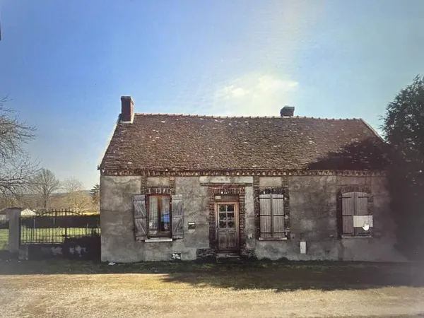 Maison ancienne à rafraîchir avec petit terrain