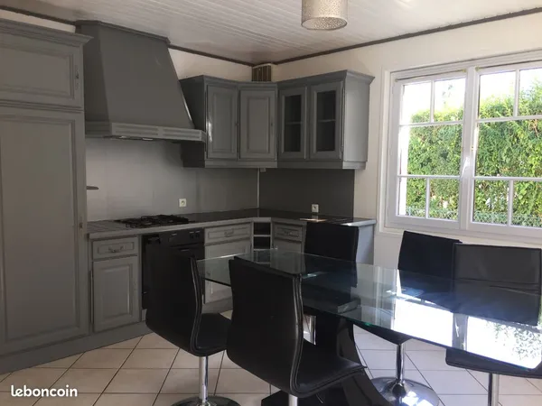 Appartement 85m2 avec terrain dans maison