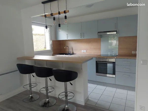 Appartement F2 49m2 + terrasse + parking + box dans résidence arborée proche gare
