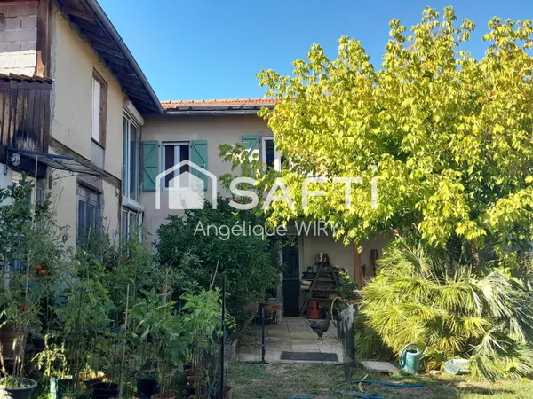 Description de cette maison de 225 m² avec jardin