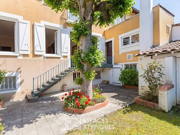 Maison 8 pièces 215 m²