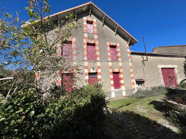 Maison de bourg de 6 pièces principales