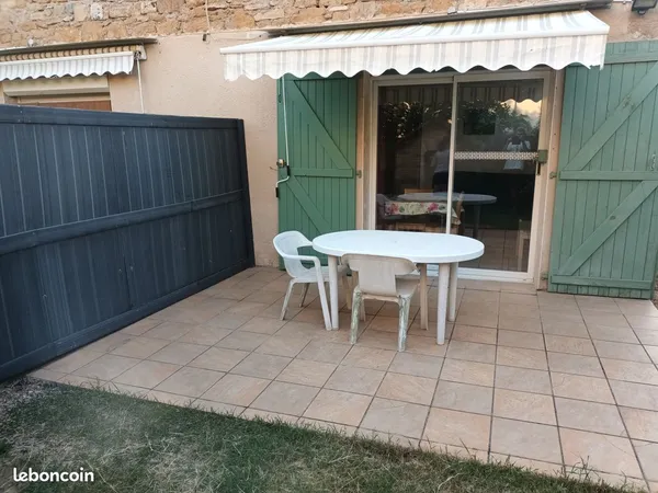 Appartement meublé 20m² chambre séparée, PAC, terrasse, parking