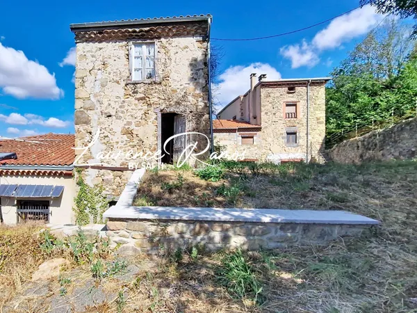 Maison à restaurer avec terrain