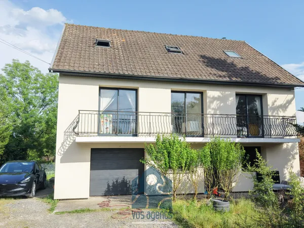 Maison 7 pièces avec garage, terrasses et jardin