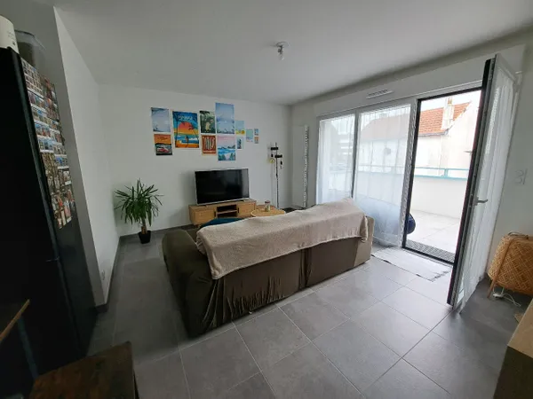 LOCATION VIDE DANS IMMEUBLE NEUF EN CENTRE VILLE
