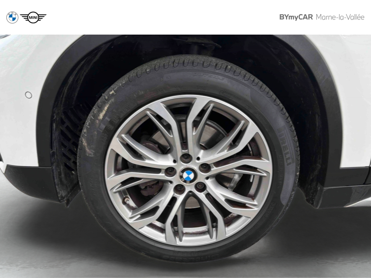 BMW X1 sDrive 18i 140 ch DKG7 — photo 18