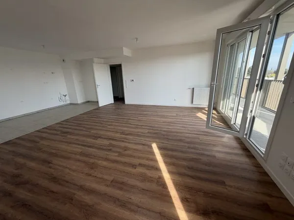 Appartement lumineux avec terrasse Parking en sous-sol - Notaire offert