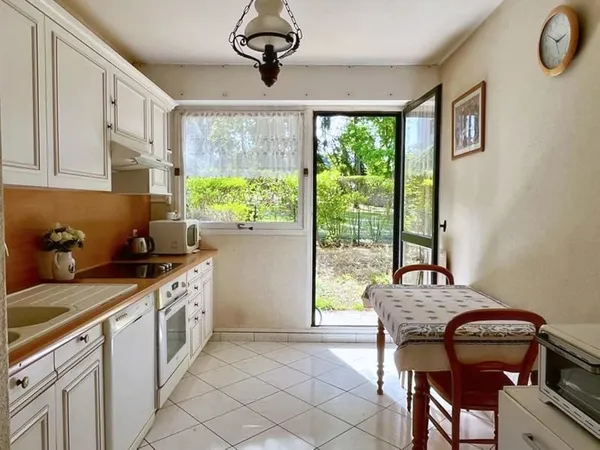 Appartement en rez de jardin de 88m² avec 2 chambres (possibilité 3)