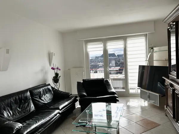 APPARTEMENT 4 PIÈCES AVEC BALCON ET GARAGE