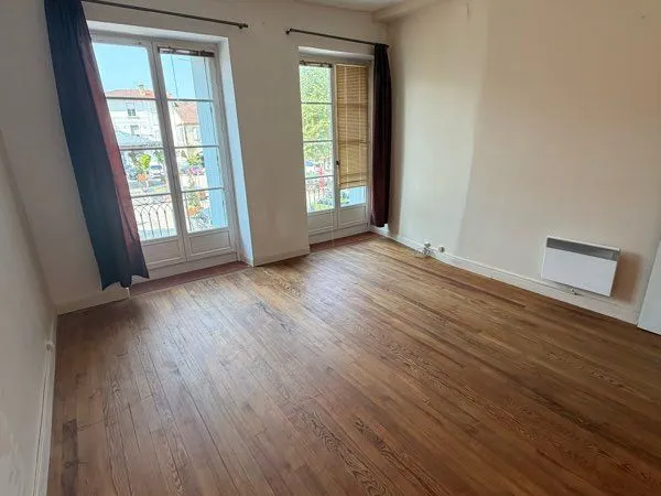 Appartement 130m2 - 4 chambres - Balcon - Beau potentiel