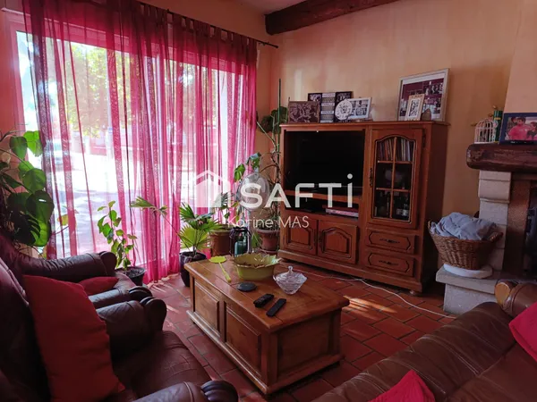 Grande maison trois chambres