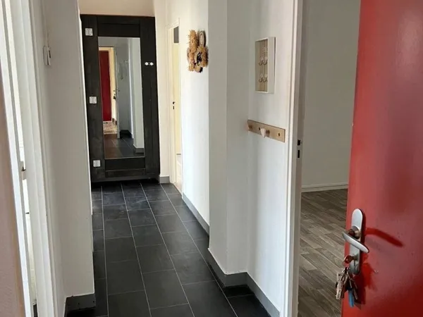 Appartement avec 3 chambres, garage.