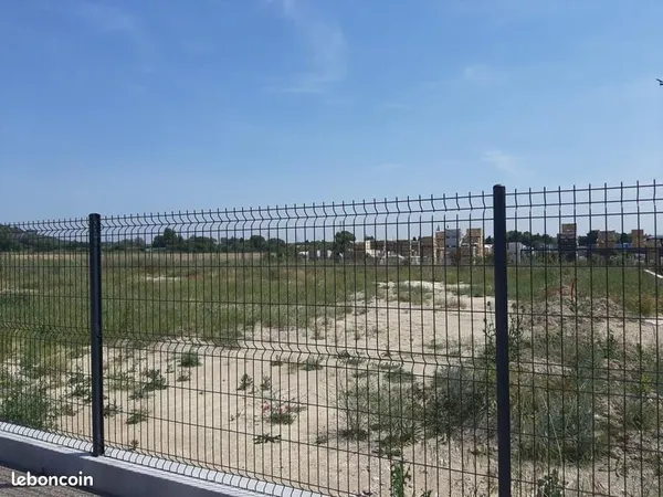 LOUE TERRAIN ZONE ARTISANALE 1200m²