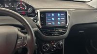Peugeot 208 1.2 PureTech 82ch E6.c Signature 5p — photo 19