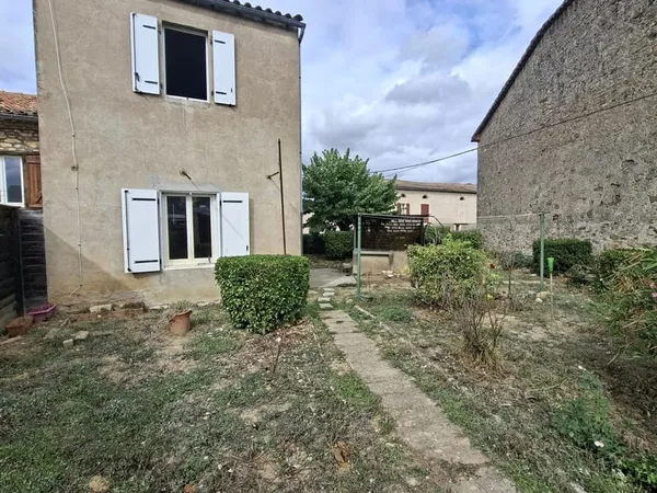 Maison avec jardin et garage