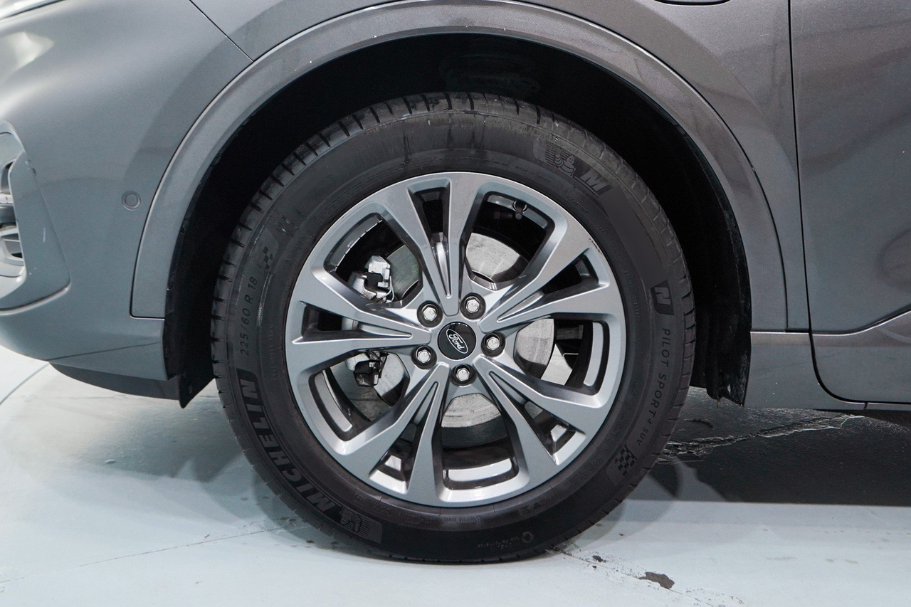 Ford Kuga — photo 10