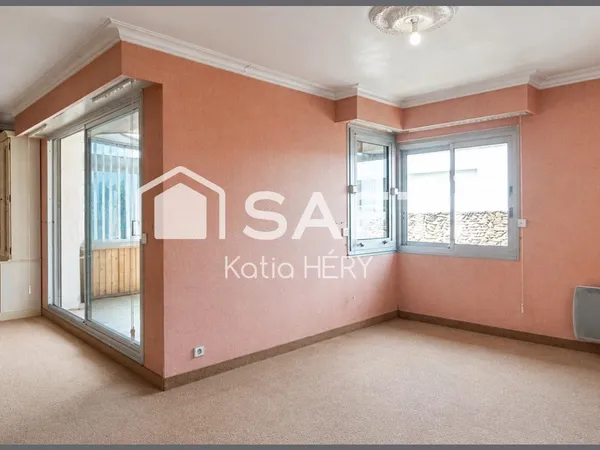 Appartement avec ascenseur, garage, cave, véranda et balcon