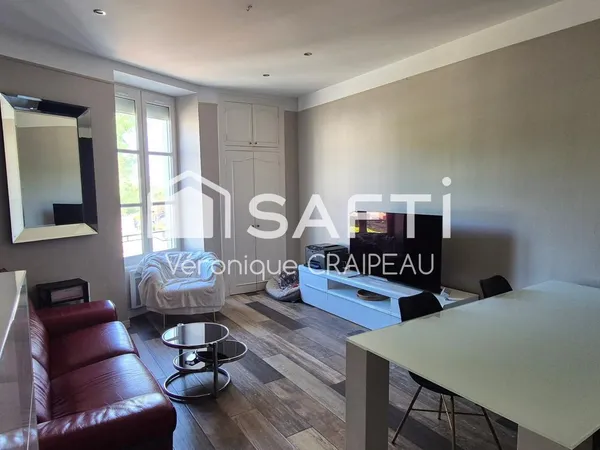 Appartement Type 4 en centre ville avec cave et garage.