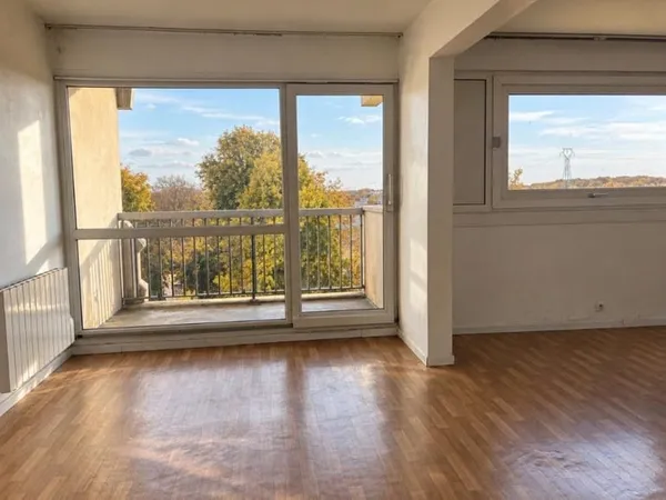 Appartement type 4 avec balcon et parking