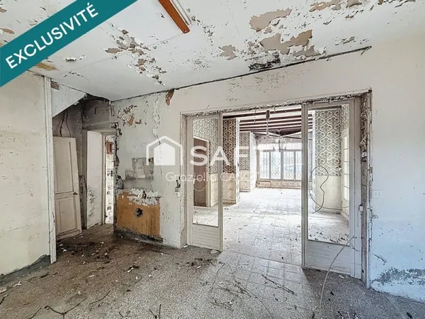 MAISON AVEC GROS TRAVAUX