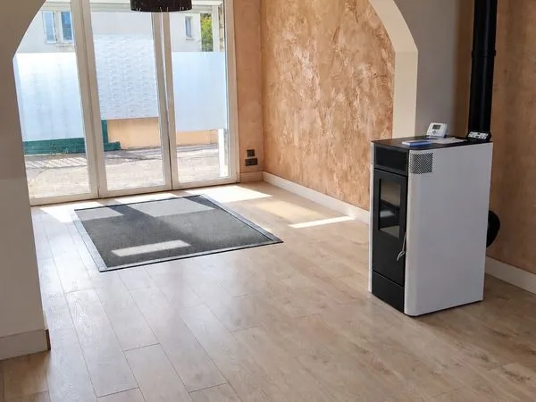 Maison familiale 3 chambres avec jardin et garage - potentiel d'aménagement
