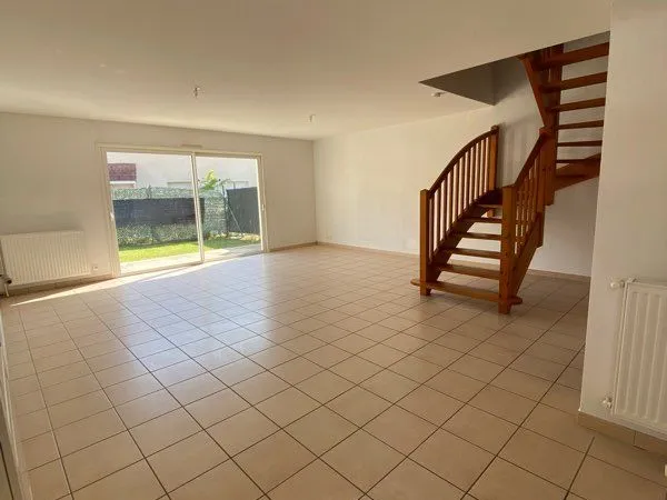 Maison jumelée 120 m2 avec garage et jardin