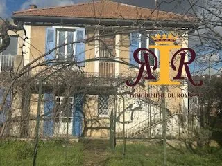 Maison année 30 proche commerces avec terrasse et terrain