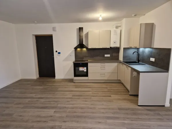 TRÈS BEL APPARTEMENT DANS UNE PETITE RÉSIDENCE NEUVE