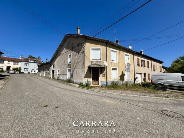 **SERVIGNY\-LÈS\-RAVILLE MAISON DE VILLAGE À RÉNOVER**