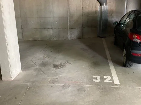 Location place de parking couverte dans résidence récente quartier la courrouze