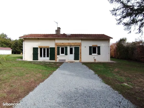 Maison en pierre avec grand garage en annexe sur St Paul