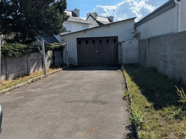 Garage + terrain - Projet d'appartement accordurbanisme