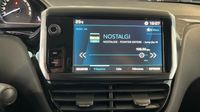 Peugeot 208 1.2 PureTech 82ch E6.2 Evap Active 5p — photo 28