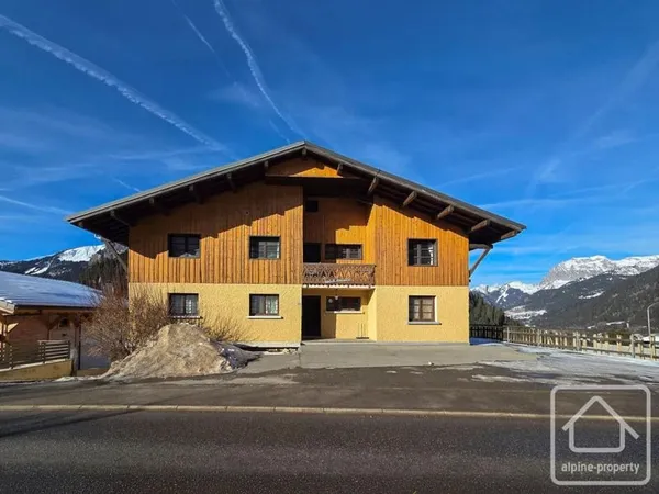 Appartement spacieux de 3 à 4 chambres avec garage, balcon et vues dégagées à Châtel centre