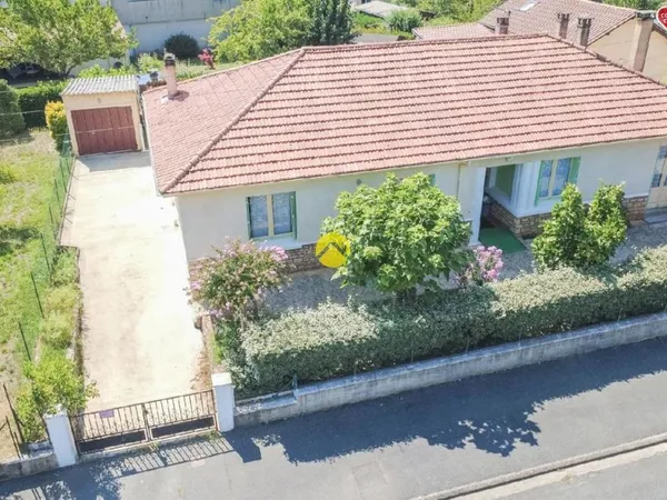 Maison de plain-pied au centre