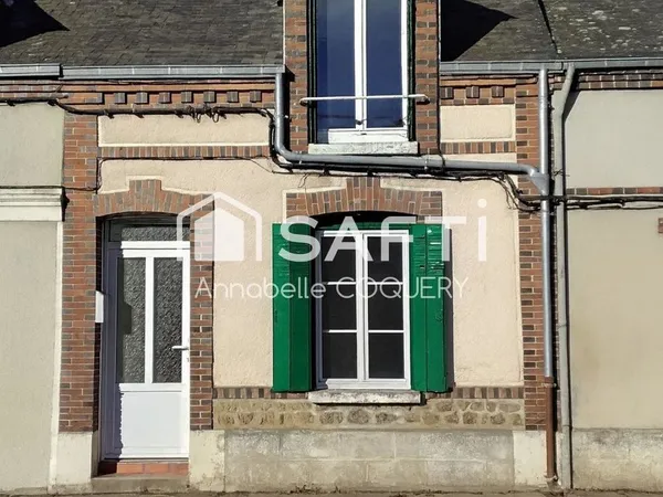 Maison de ville avec jardin à deux pas du centre