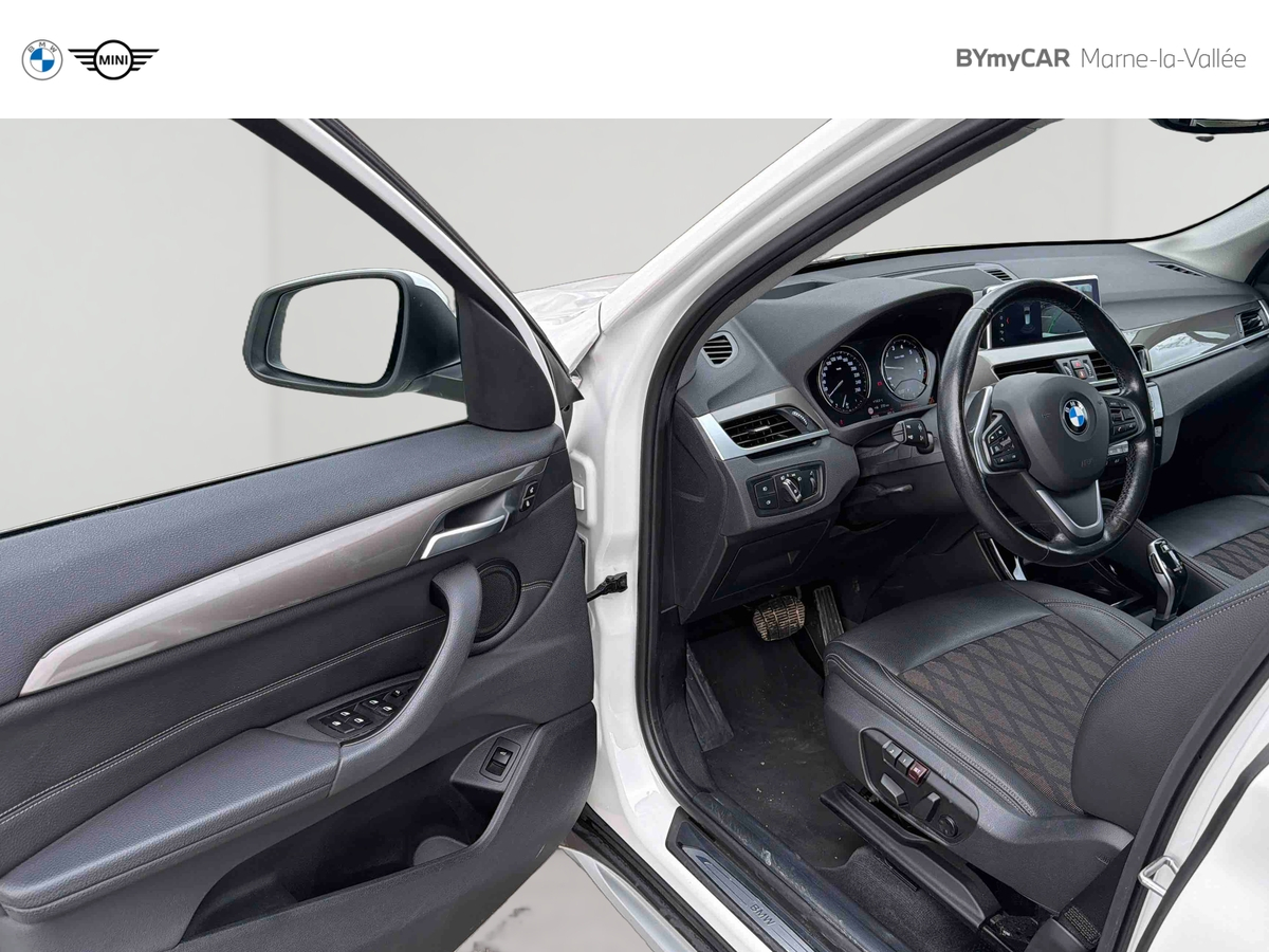 BMW X1 sDrive 18i 140 ch DKG7 — photo 31