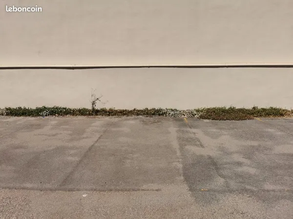 Place de parking sécurisée Gratte-Ciel - Charges : 48/AN