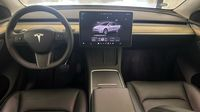 Tesla Model Y Standard RWD — photo 11
