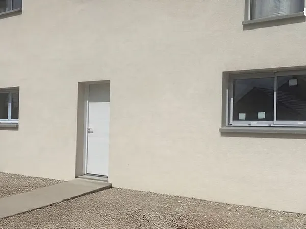 Loft 70m2 , 2 chambres avec garage et jardin à terminer à Frasne