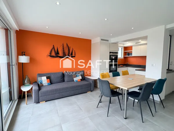 Appartement de standing 2 chambres à 50m de la plage avec garage + place de stationnement