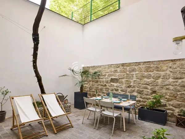 Appartement de 100m² avec 3 chambres sur 2 niveaux avec terrasse de 26m² - 250m du Métro Guy Môquet