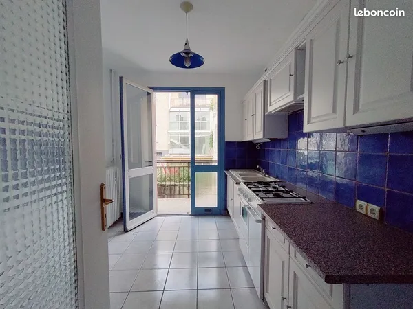 Appartement 3 pièces, 58m², balcon, et garage couvert