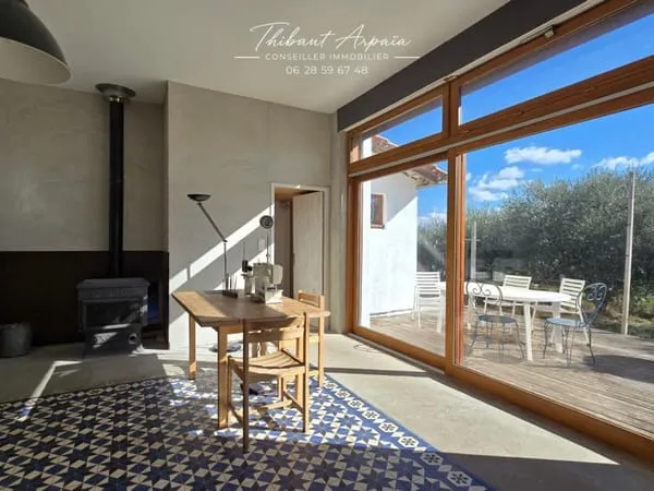 Maison bioclimatique à ossature bois avec T2 indépendant - Terrain de 1 664 m²