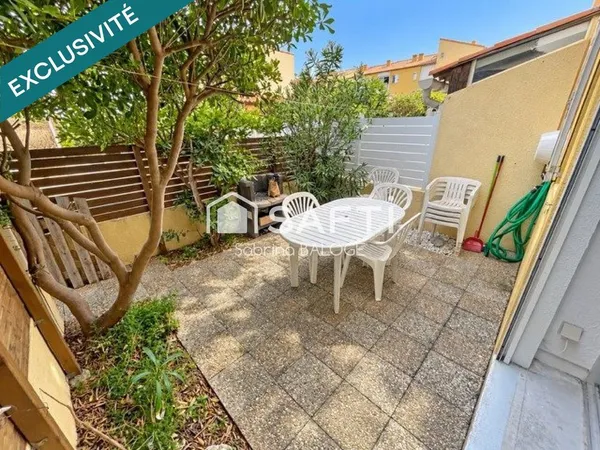 Appartement en rez-de-jardin avec belle terrasse