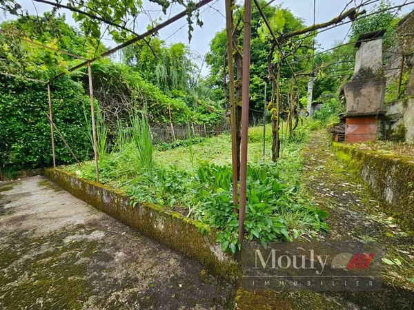 MAISON AVEC JARDIN CENTRE VILLE A PIED .